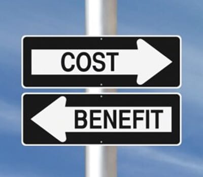 Cost versus benefit street sign arrows pointing in two directions